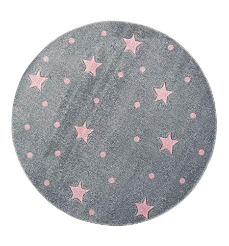 Alfombra redonda gris con estrellas rosas de polipropileno con pequeño precio.