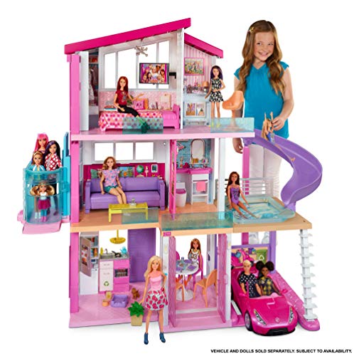 La casa de los sueños de la muñeca Barbie con piscina y tobogán y garaje para el descapotable