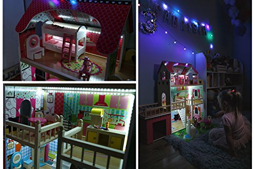 Una gran casa de muñecas de madera con luces LED de Kinderplay en un estilo femenino y romántico para una decoración exitosa.