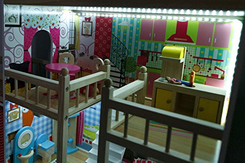 Una gran casa de muñecas de madera con luces LED de Kinderplay en un estilo femenino y romántico para una decoración exitosa.