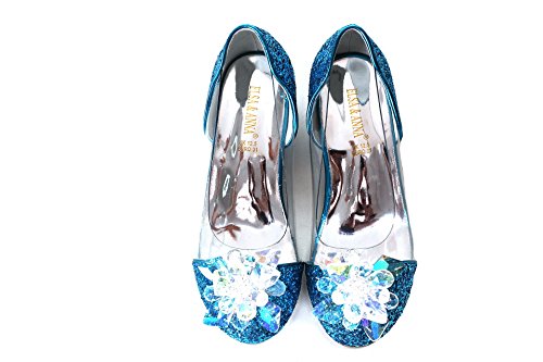 Zapatos azules de princesa con joyas brillantes y tacones